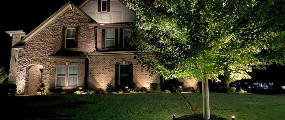 Home in Lake Norman, NC, illuminated with lights.