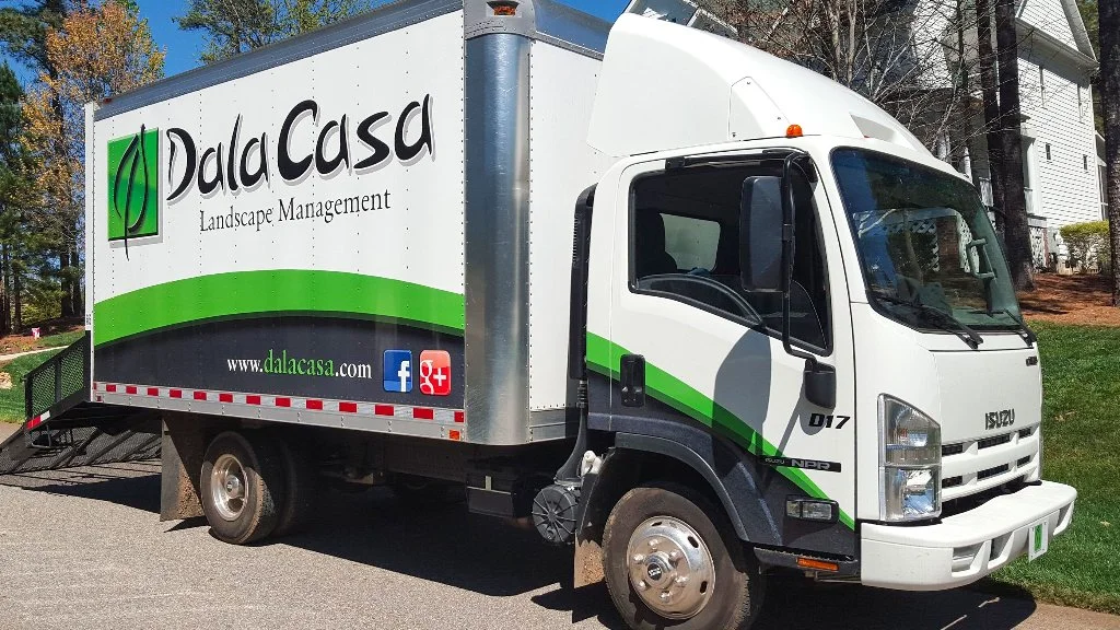 DalaCasa Landscape Management box truck at customer's home.