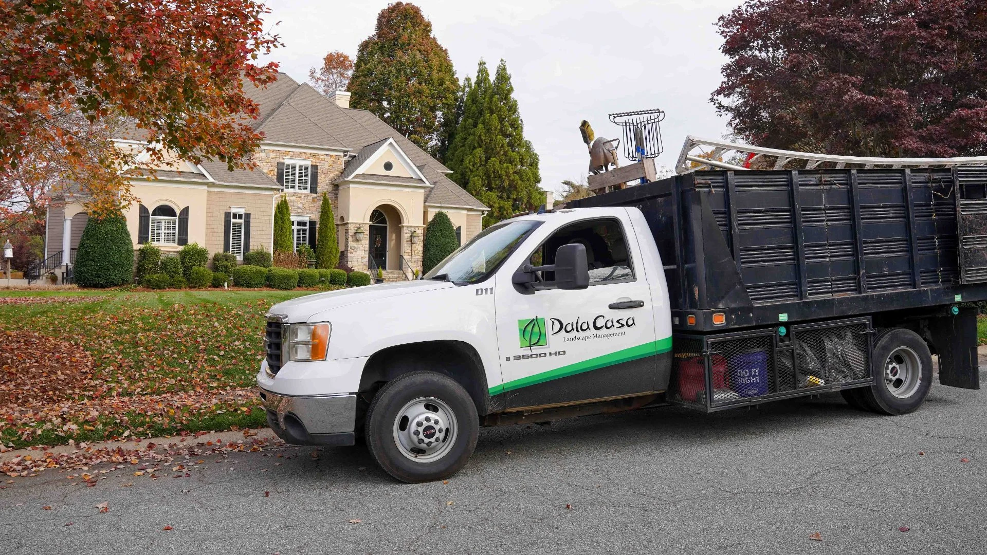 DalaCasa Landscape Management truck at a customer's home.