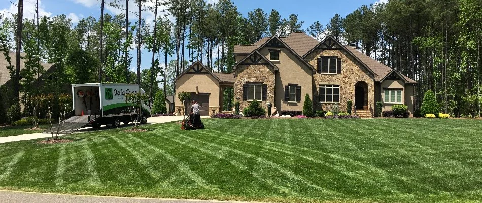 House in Indian Trail, NC, with the lawn being mowed.