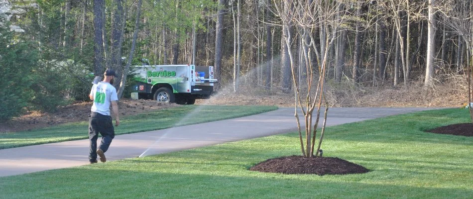 Employee starting up irrigation system in Rock Hill, SC.