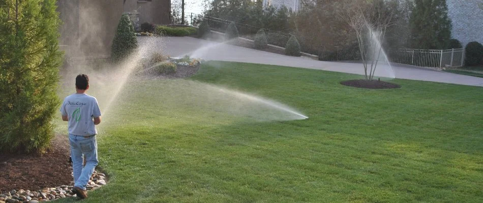 Sprinkler heads watering lawn in Kannapolis, NC.