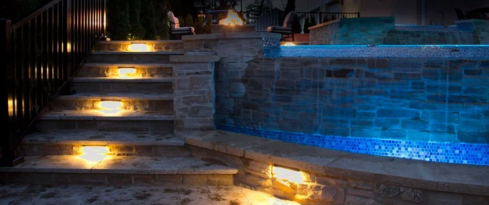 Outdoor steps with lighting and a pool in Indian Trail, NC.