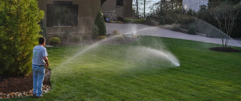 An irrigation system with several sprinklers on a property in Indian Land, NC.