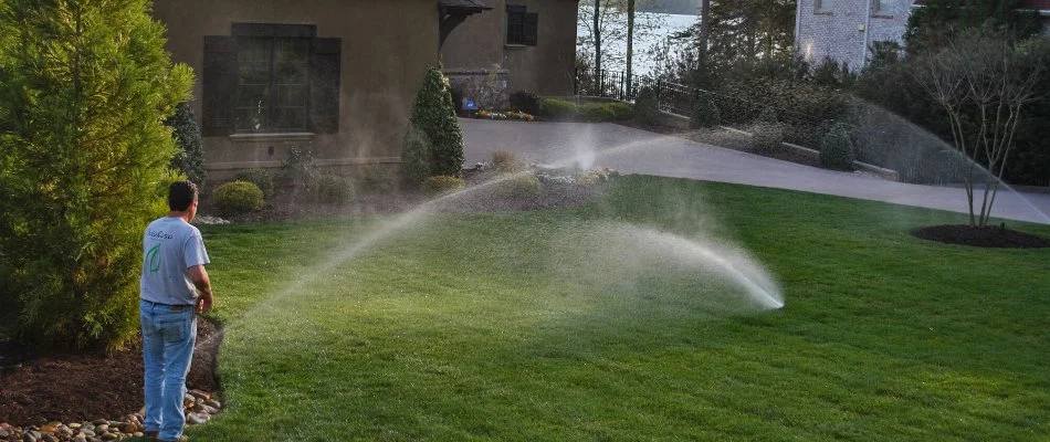 Running irrigation system on a lawn in Charlotte, NC.