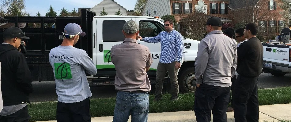 Team huddle before working on property.