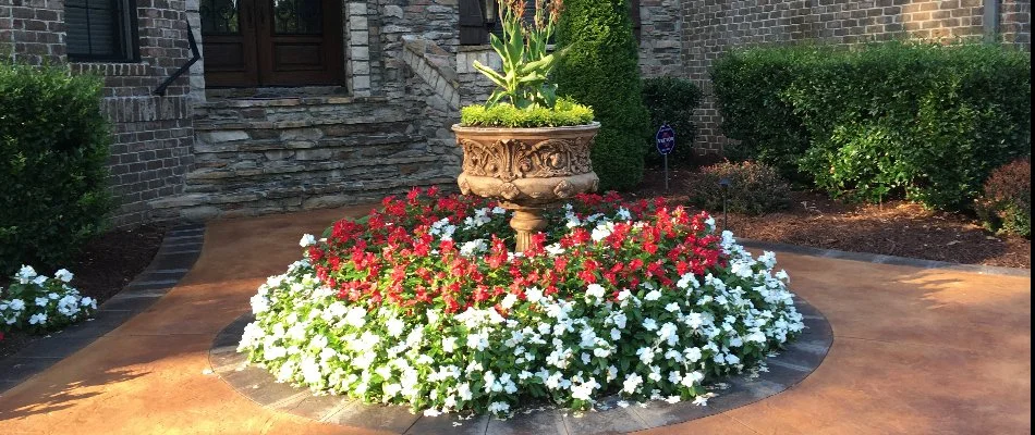 White and red flowers as a center decoration on a property in Waxhaw, NC.