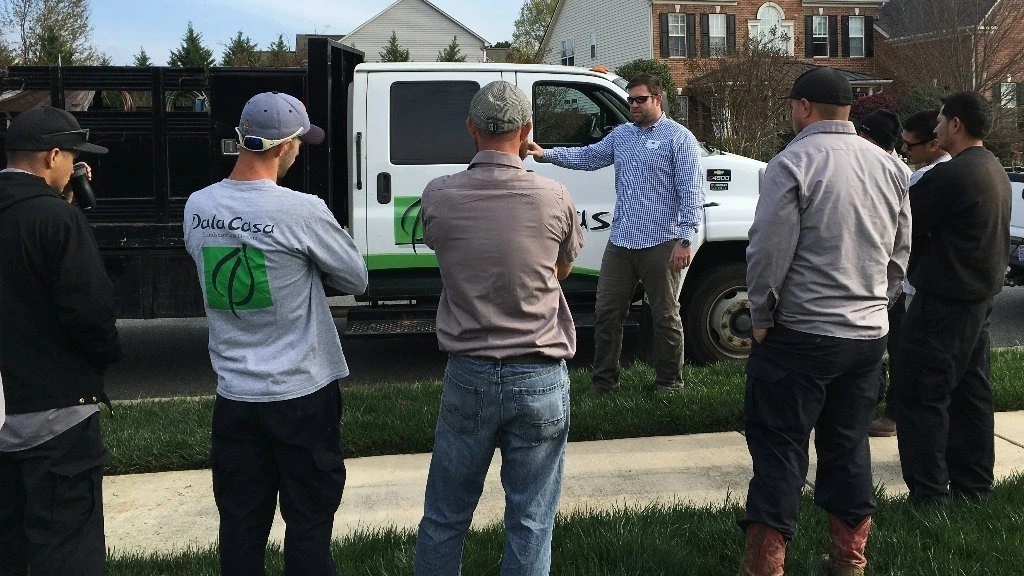 DalaCasa Landscape Management team training on a job site.