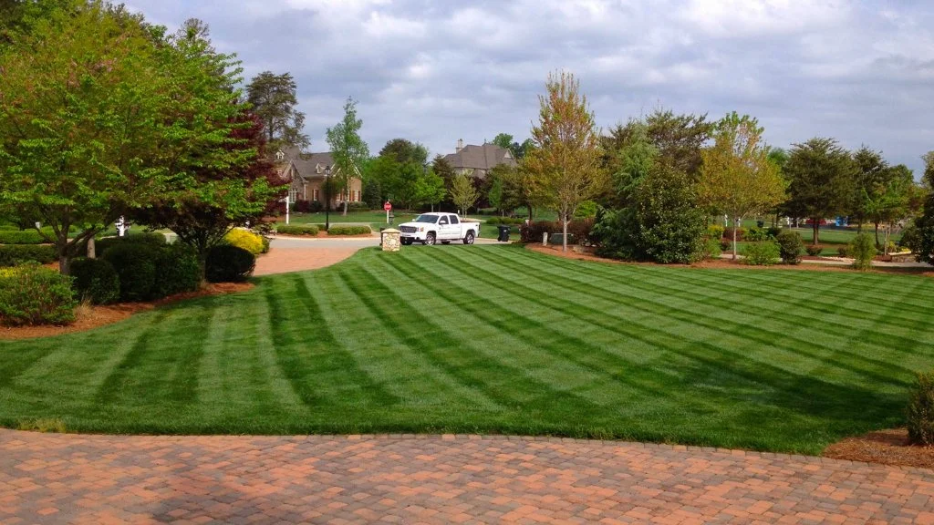 Home in Lake Norman, NC with mowed stripes and trimmed landscaping.